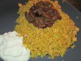 Tfaya (sauce aux oignons et raisins secs) au boulghour de kamut et pois chiche