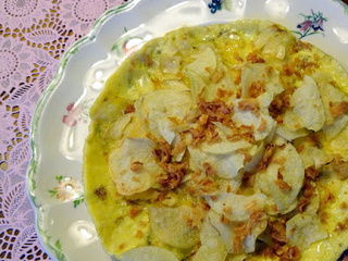 Omelette aux chips de pommes de terre et oignons séchés par Eric Frechon