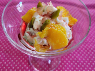 Ricotta à l'orange, citron confit, olives et réduction de Campari