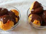 Profiteroles (puffs with vanilla ice cream and chocolate sauce)
